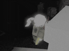 a black and white drawing of a person standing in a dark room