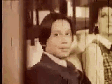 a close up of a person 's face in a blurry photo .
