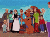 scooby doo and his friends are standing in a crowd