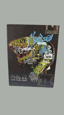 a black box with s & r black works studio on it