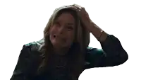 a woman holds her hand up to her head and looks up