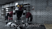 a robot says it 's only tuesday in a room
