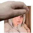 a hand is holding a woman 's face in a pixel art .