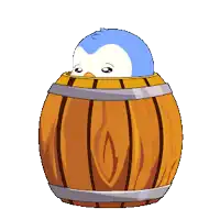 a penguin is sitting in a wooden barrel