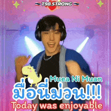 a man wearing headphones is dancing in front of a pink background that says today was enjoyable