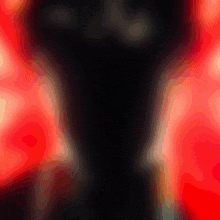 a red and black background with a silhouette of a person in the middle