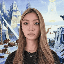a woman wearing a cross necklace stands in front of a painting of a pyramid