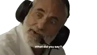 a man with a beard wearing headphones and a microphone says what did you say