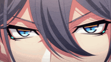 a close up of a person 's blue eyes with a yellow stripe