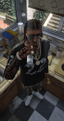 a man smoking a cigarette in a kitchen with a box of cheerios on the counter
