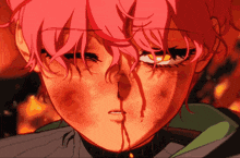 a close up of a person 's face with red hair