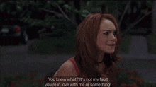 a woman in a pink bra says you know what it 's not my fault you 're in love with me or something ..