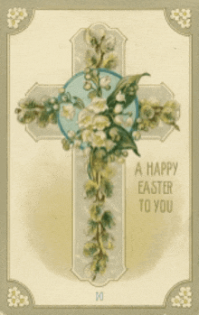a cross with lily of the valley flowers on it and the words a happy easter to you