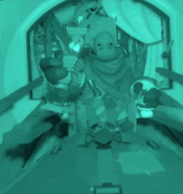 a green colored image of a room with a clock on the wall that says ' a ' on it