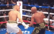 Conormcgregor Punch GIF - Conormcgregor Punch Floyd Mayweather GIFs