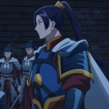 a man with a ponytail stands in front of a group of men