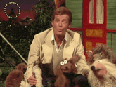 a man holds a stuffed animal with googly eyes in his hands