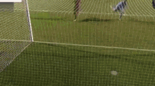 a soccer game is being played on a field with a banner that says ' atacadoista ' on it