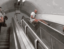 Running Down GIF - Running Down Escalator GIFs