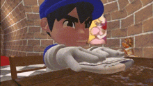 a cartoon character is sitting at a table in front of a brick wall and playing a video game .