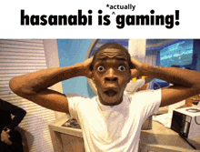 a man with his hands on his head and the words " hasanabi is gaming " above him