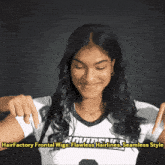 a woman wearing a shirt that says hairfactory on it