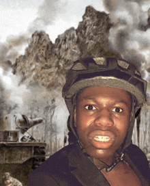 a man wearing a helmet stands in front of a smoke filled mountain