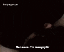 a close up of a person 's face with the words `` because i 'm hungry ! ''