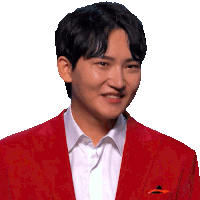 a man wearing a red jacket and a white shirt smiles