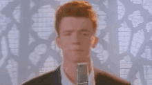 Rick Astley Never Gonna Give You Up GIF - Rick Astley Never Gonna Give You Up Gonna Make You Die GIFs