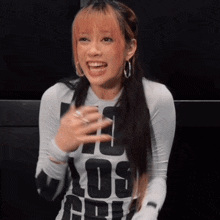 a woman wearing a shirt that says los angeles