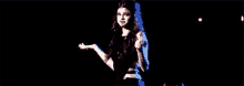 Selena Gomez Shrug GIF - Selena Gomez Shrug Stage GIFs