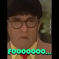 a man wearing glasses and a yellow shirt has the word fooooo on his face