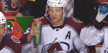 colorado avalanche nathan mackinnon throws bottle angry mad