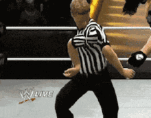 wwe wrestling referee thumbs up weird