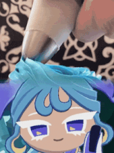 a close up of a person drawing a cartoon character