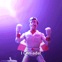 a toy figure with a canadian flag on his chest says i can-ada