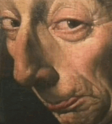 a close up of a painting of a man 's face with two faces .