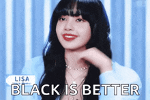 a woman with long black hair and red lips is smiling and says `` black is better '' .