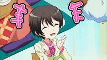 a girl in a pink shirt is smiling with two pink letters above her head that say " y "