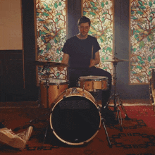 Playing The Drums Cloud Nothings GIF - Playing The Drums Cloud Nothings Running Through The Campus Song GIFs