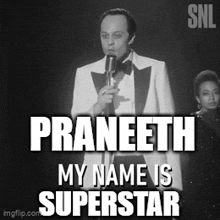 a man in a tuxedo stands in front of a microphone with the words praneeth my name is superstar