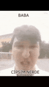 a close up of a man 's face with the words baba cipsim nerde bottom text .