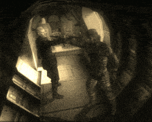 a man holding a gun in a room with a sign that says ' emergency exit '