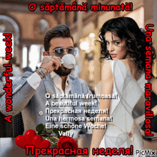 a man drinking a cup of coffee next to a woman in a white dress with red hearts