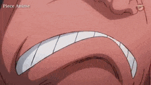 a close up of a cartoon character 's face with a very angry expression .
