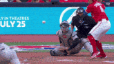 a baseball player with the number 4 on his shirt