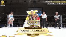 a wrestler named nanae takahashi is standing in a wrestling ring