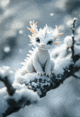 a white dragon sitting on a snowy branch