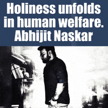 a black and white photo of a man with the words holiness unfolds in human welfare